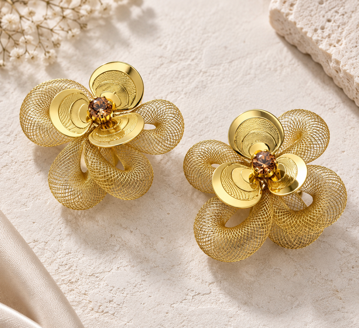Close-up of Adéniké Mesh Earrings with crystal accents