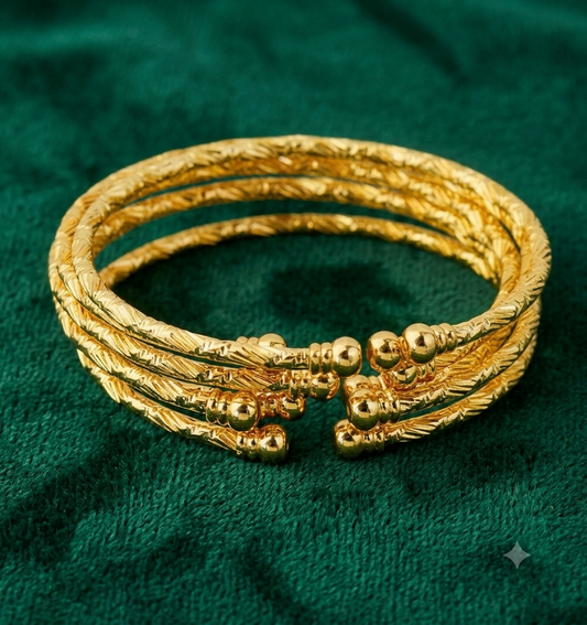 6 piece 24 karat Gold Plated bangle and bracelets