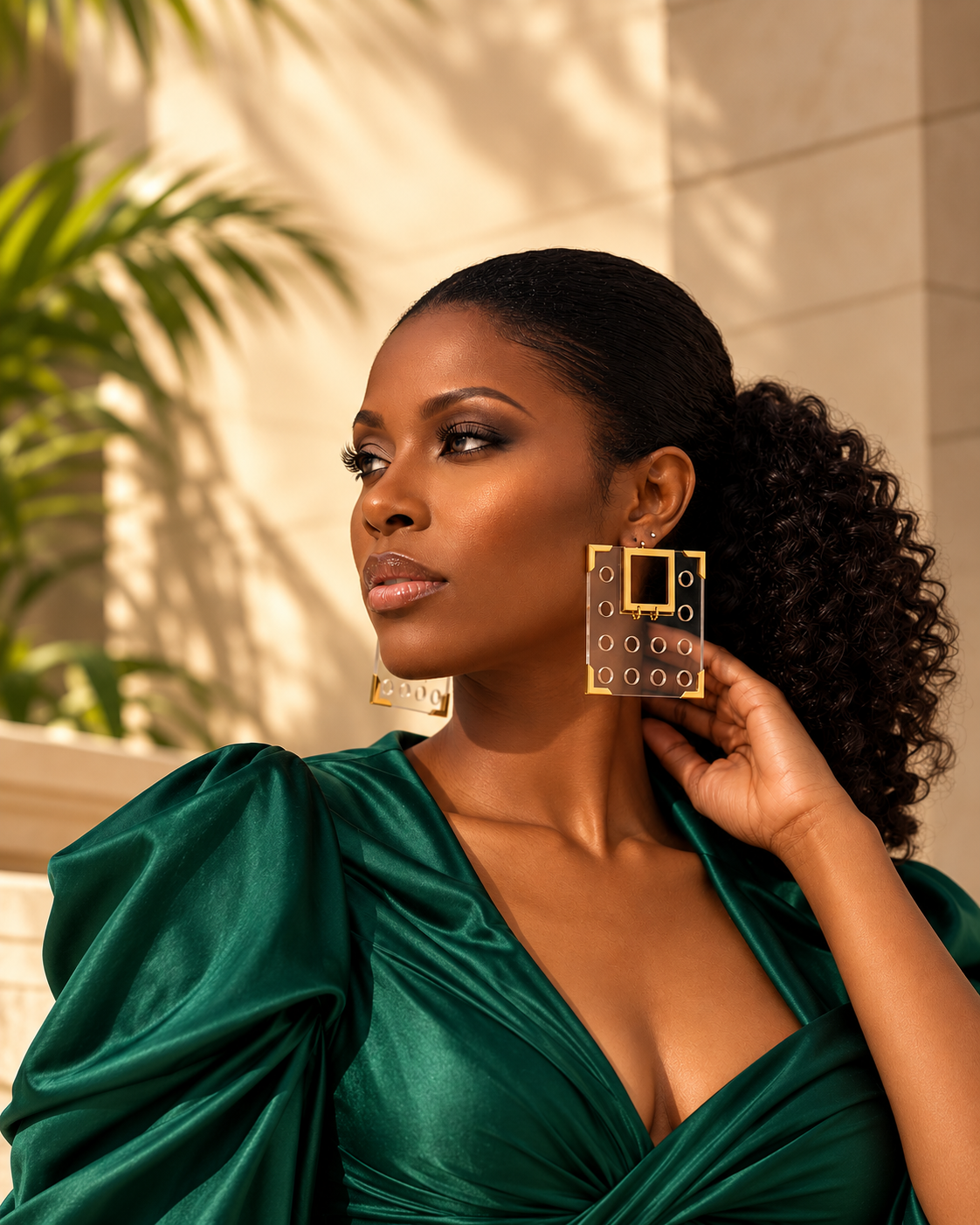 Model wearing Regal Afrique Geo geometric earrings
